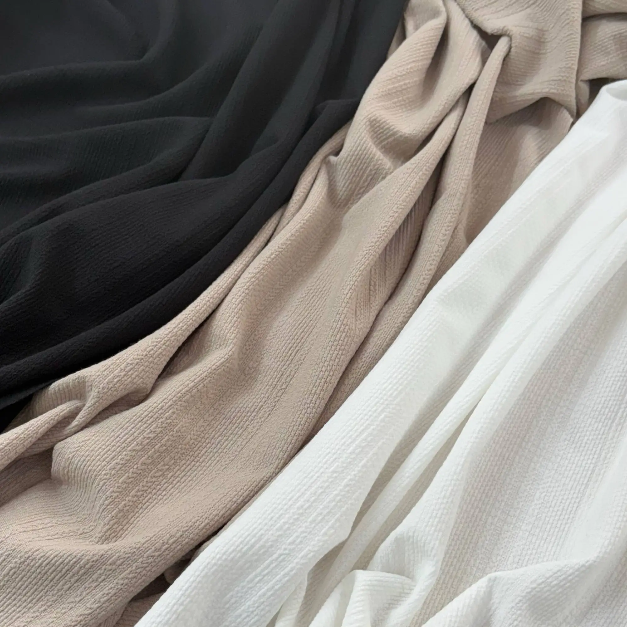 ⁦בד גרזי דוגמת צמות בז בהיר⁩ – תמונה ⁦4⁩