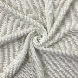 בד לייקרה כיווצים לבן חלבי